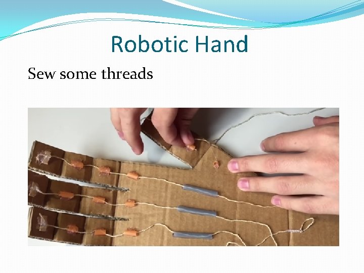 Robotic Hand Sew some threads 