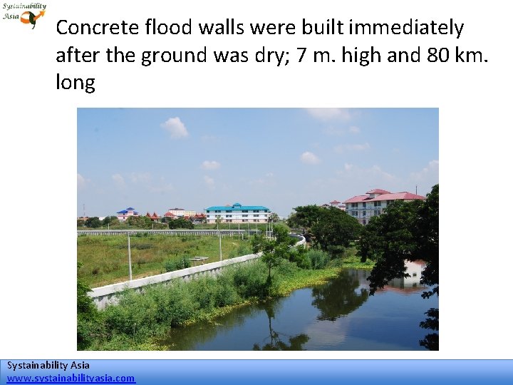 Concrete flood walls were built immediately after the ground was dry; 7 m. high