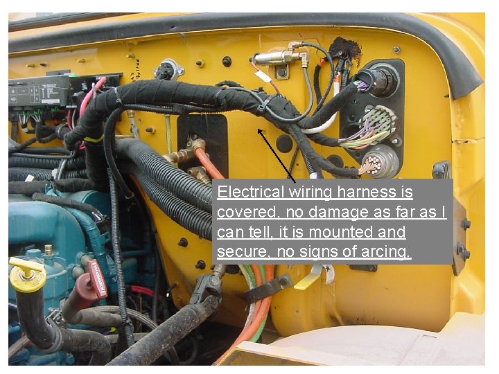 Electrical wiring harness is covered, no damage as far Electrical wiring harness is as