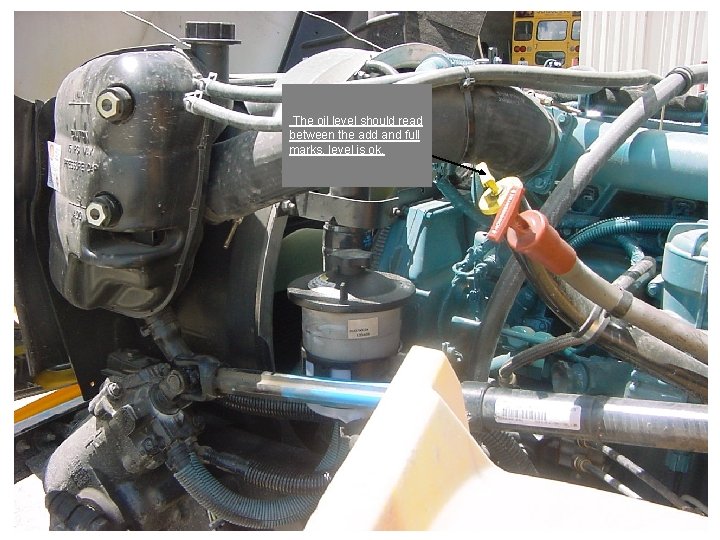 The oil level should read between the add and full marks, level is ok.