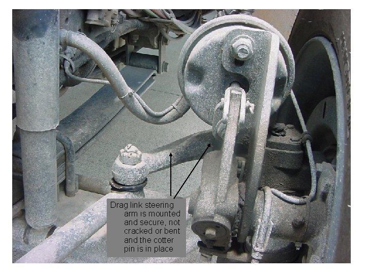 Drag link steering arm is mounted and secure, not cracked or bent and the