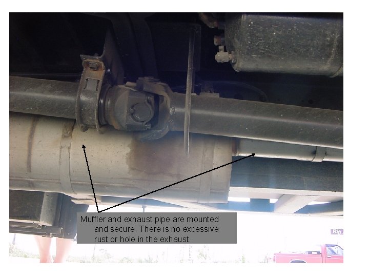 Muffler and exhaust pipe are mounted and secure. There is no excessive rust or
