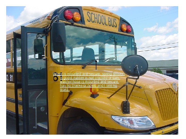 Wiper is mounted and secure, spring tension is good, rubber is not cracked or