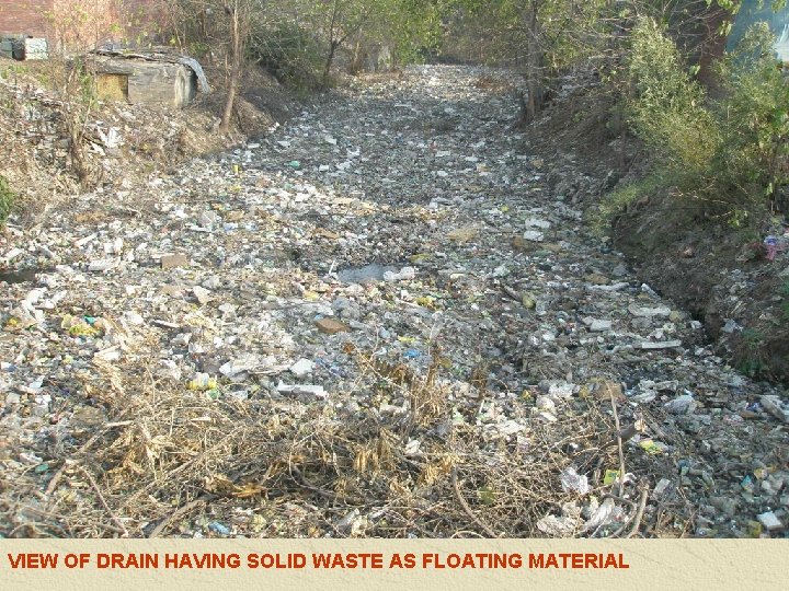 VIEW OF DRAIN HAVING SOLID WASTE AS FLOATING MATERIAL 