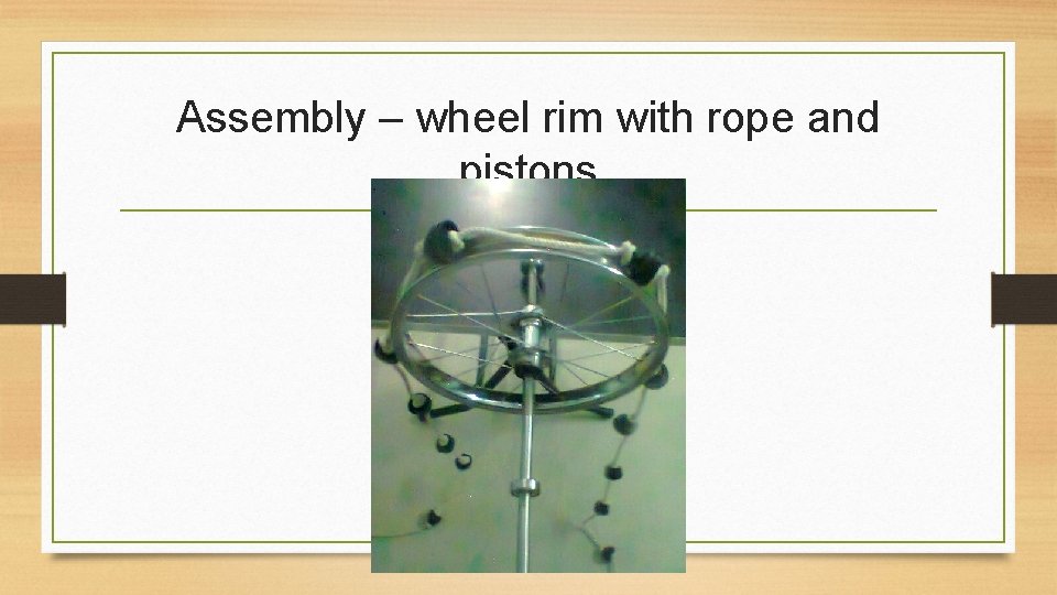 Assembly – wheel rim with rope and pistons 