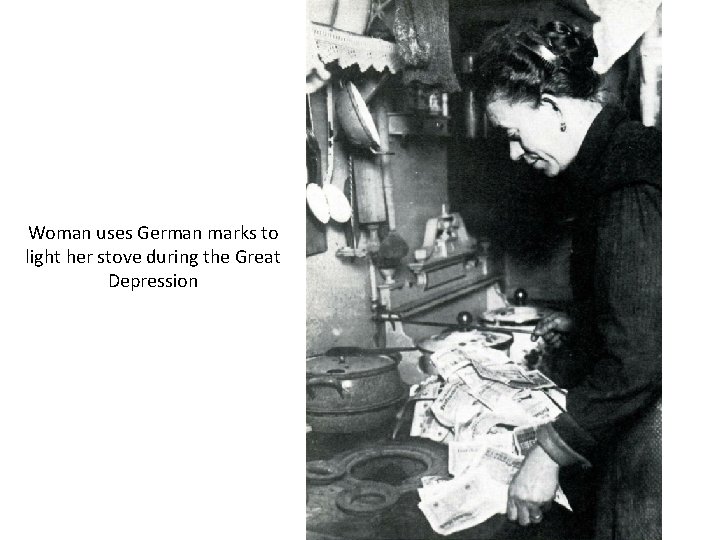 Woman uses German marks to light her stove during the Great Depression 