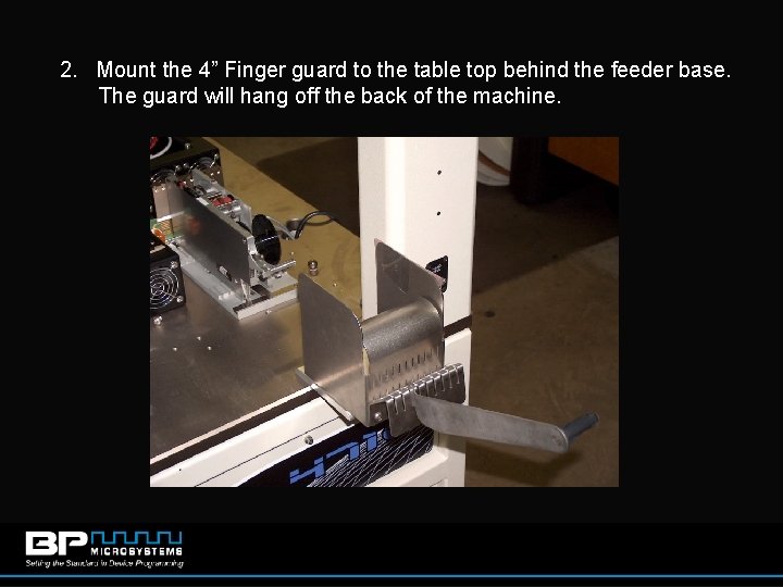 2. Mount the 4” Finger guard to the table top behind the feeder base.