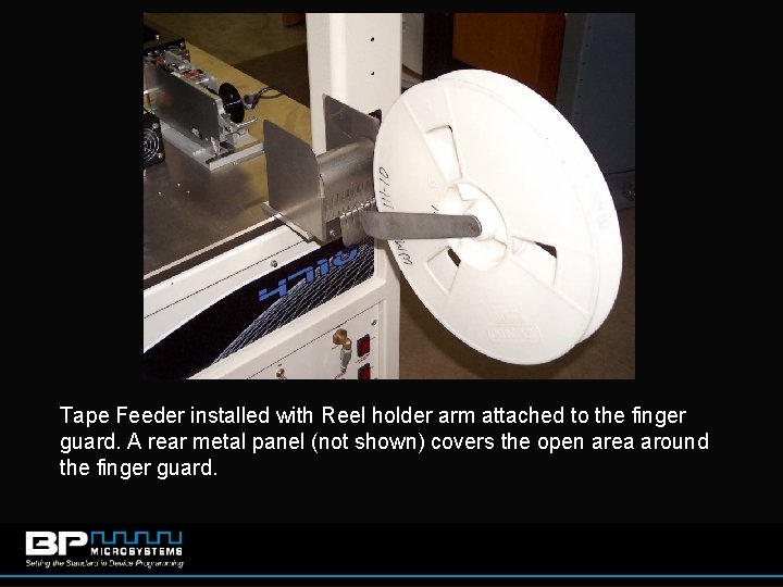 Tape Feeder installed with Reel holder arm attached to the finger guard. A rear
