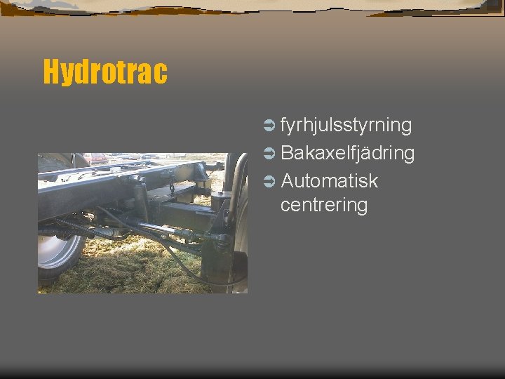 Hydrotrac Ü fyrhjulsstyrning Ü Bakaxelfjädring Ü Automatisk centrering 