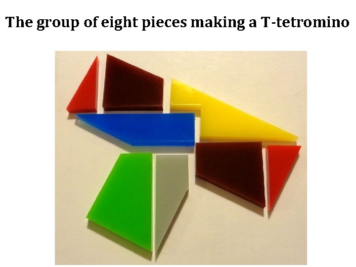 The group of eight pieces making a T‑tetromino 
