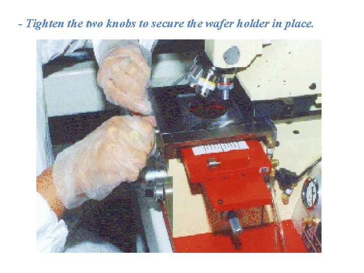 - Tighten the two knobs to secure the wafer holder in place. 