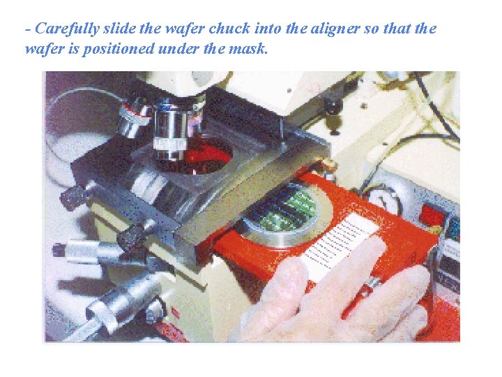 - Carefully slide the wafer chuck into the aligner so that the wafer is