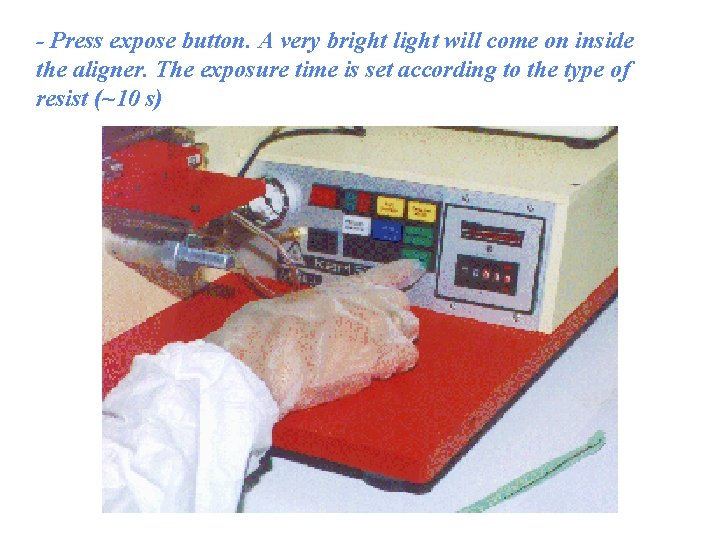 - Press expose button. A very bright light will come on inside the aligner.