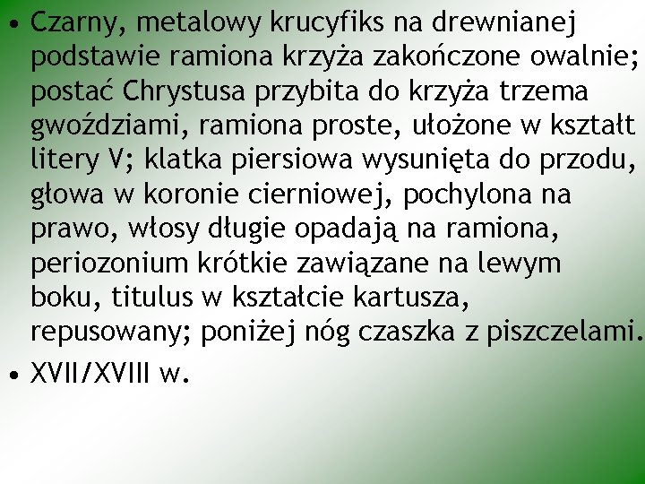  • Czarny, metalowy krucyfiks na drewnianej podstawie ramiona krzyża zakończone owalnie; postać Chrystusa