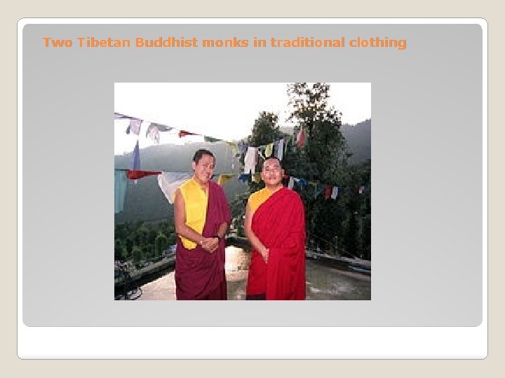 Two Tibetan Buddhist monks in traditional clothing 