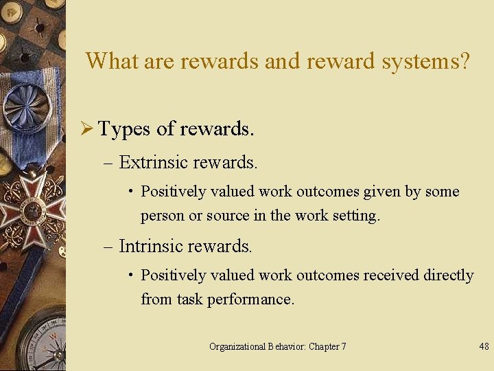 What are rewards and reward systems? Ø Types of rewards. – Extrinsic rewards. •