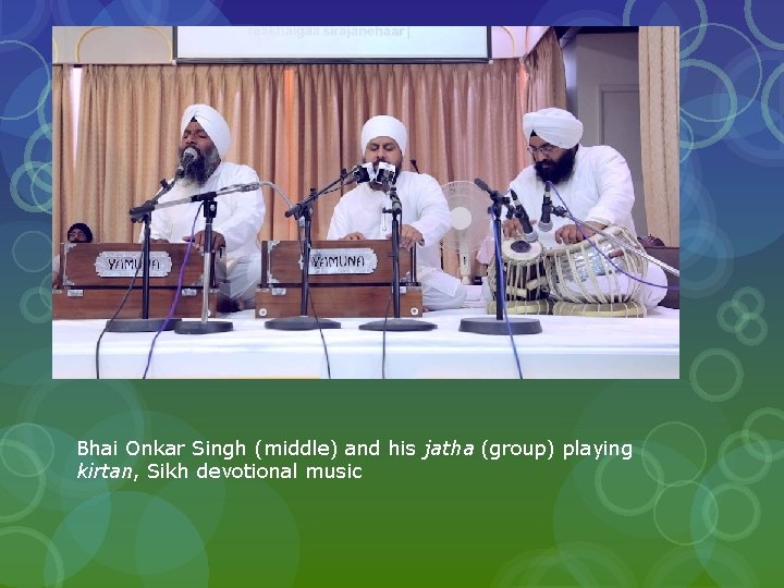 Bhai Onkar Singh (middle) and his jatha (group) playing kirtan, Sikh devotional music 