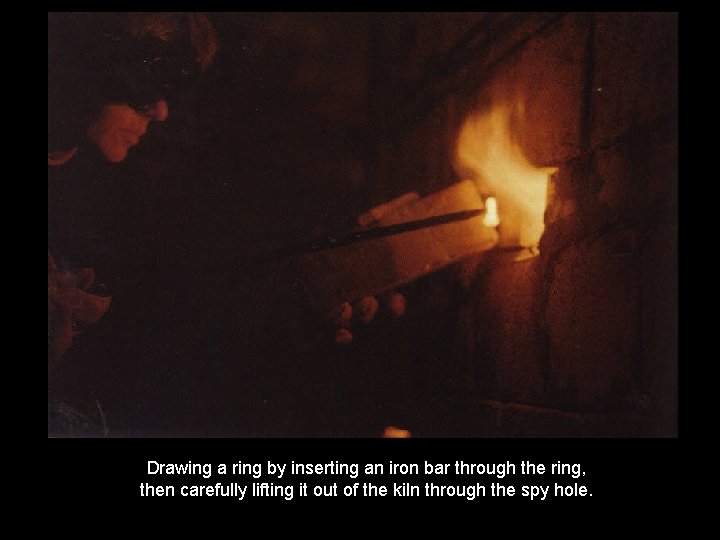 Drawing a ring by inserting an iron bar through the ring, then carefully lifting