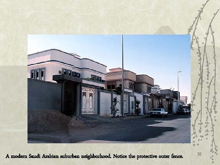 A modern Saudi Arabian suburban neighborhood. Notice the protective outer fence. 30 