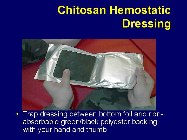 Chitosan Hemostatic Dressing • Trap dressing between bottom foil and nonabsorbable green/black polyester backing