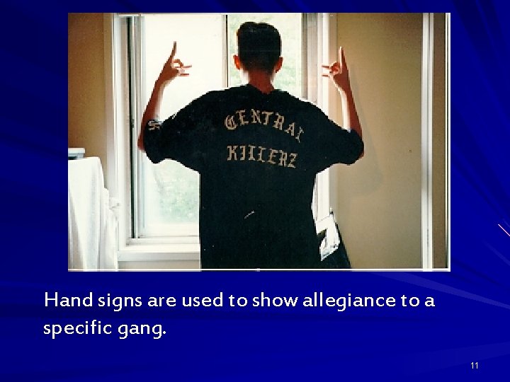 Hand signs are used to show allegiance to a specific gang. 11 