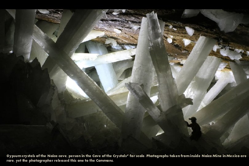 Gypsum crystals of the Naica cave, person in the Cave of the Crystals” for