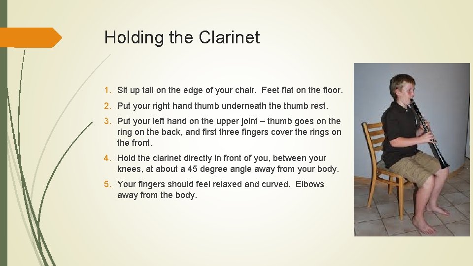 Holding the Clarinet 1. Sit up tall on the edge of your chair. Feet