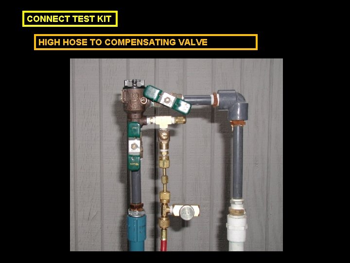 CONNECT TEST KIT HIGH HOSE TO COMPENSATING VALVE 