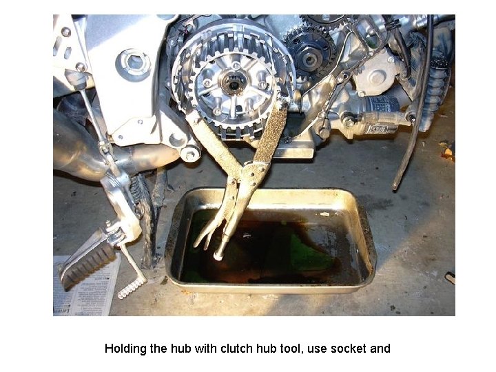 Holding the hub with clutch hub tool, use socket and 