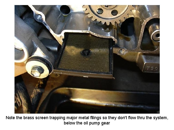 Note the brass screen trapping major metal filings so they don't flow thru the