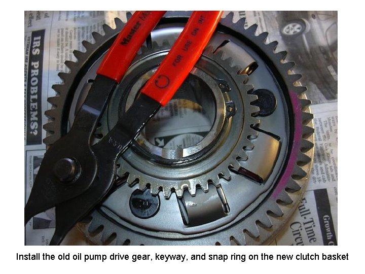 Install the old oil pump drive gear, keyway, and snap ring on the new