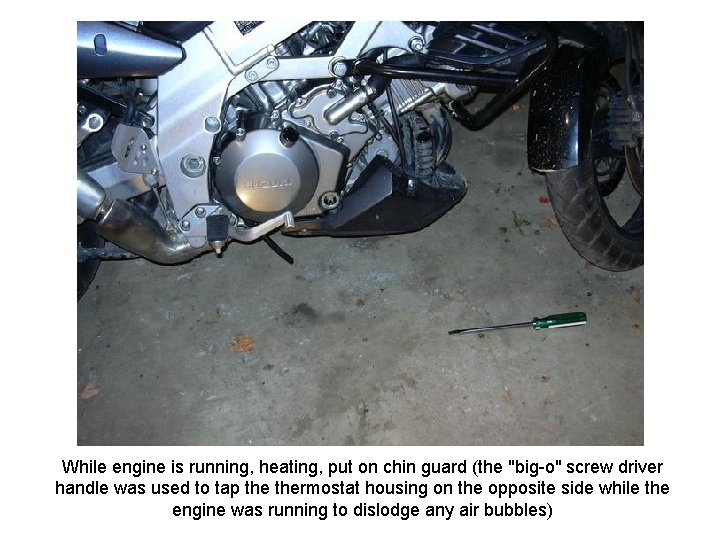 While engine is running, heating, put on chin guard (the "big-o" screw driver handle