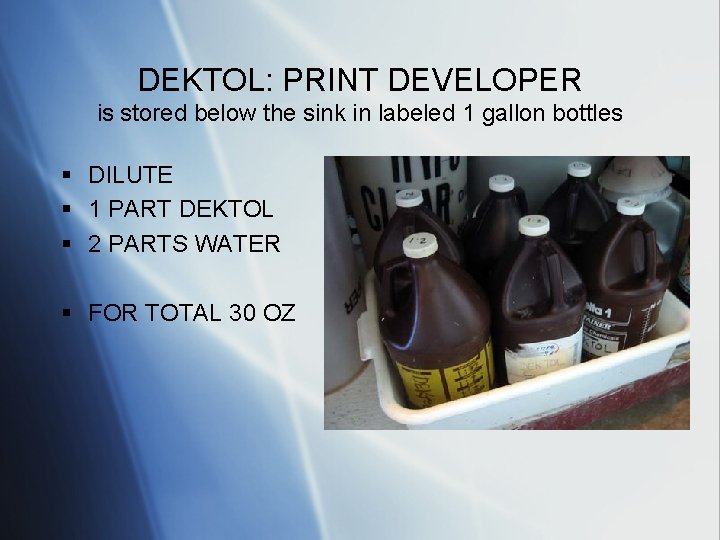 DEKTOL: PRINT DEVELOPER is stored below the sink in labeled 1 gallon bottles §