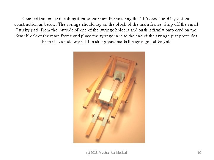 Connect the fork arm sub-system to the main frame using the 11. 5 dowel