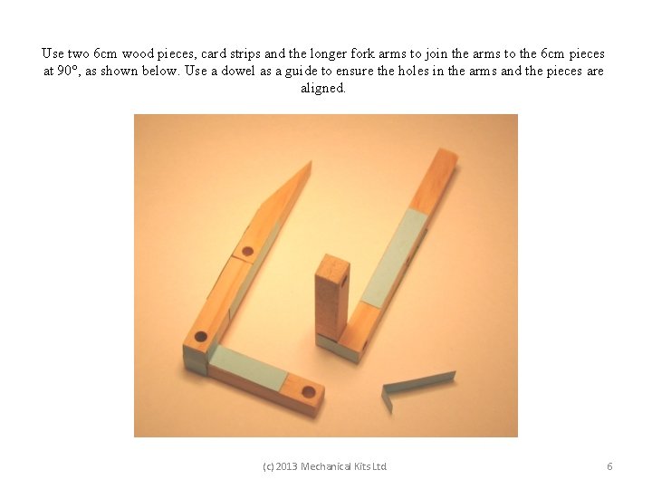 Use two 6 cm wood pieces, card strips and the longer fork arms to