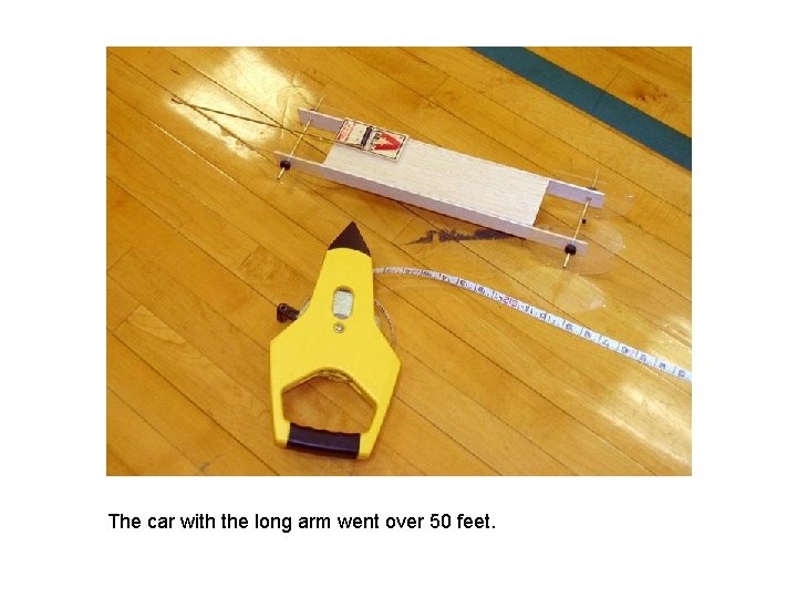 The car with the long arm went over 50 feet. 