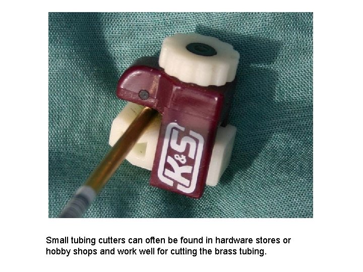 Small tubing cutters can often be found in hardware stores or hobby shops and