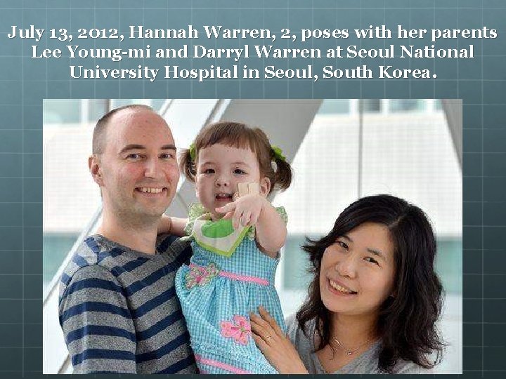 July 13, 2012, Hannah Warren, 2, poses with her parents Lee Young-mi and Darryl