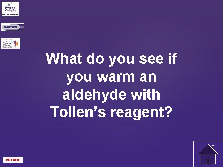 What do you see if you warm an aldehyde with Tollen’s reagent? 