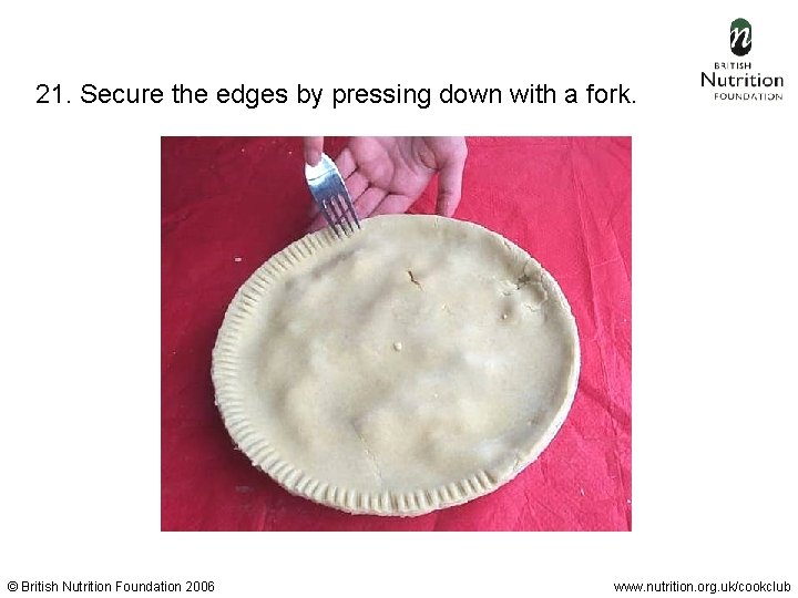  21. Secure the edges by pressing down with a fork. © British Nutrition