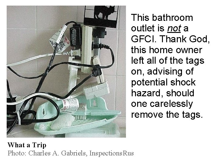 This bathroom outlet is not a GFCI. Thank God, this home owner left all