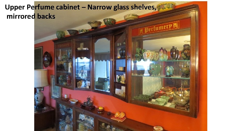 Upper Perfume cabinet – Narrow glass shelves, mirrored backs 