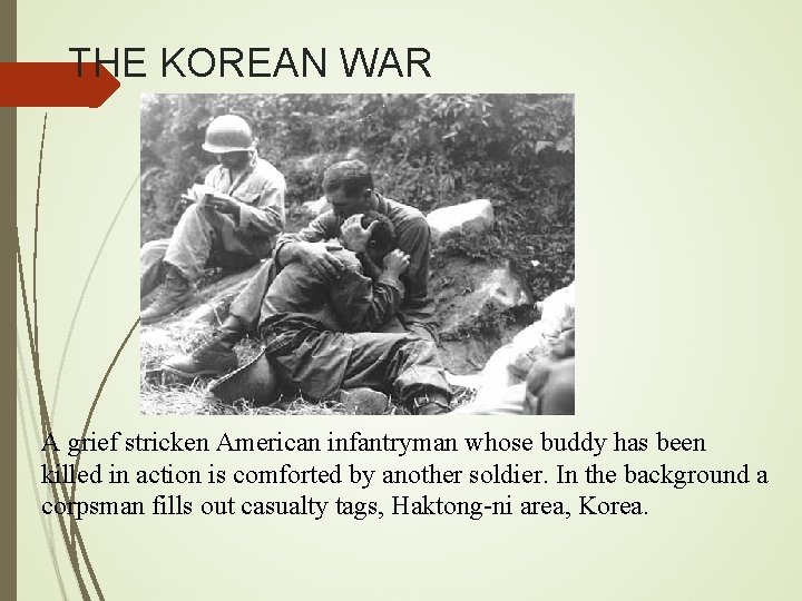 THE KOREAN WAR A grief stricken American infantryman whose buddy has been killed in
