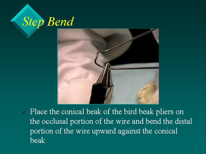 Step Bend v Place the conical beak of the bird beak pliers on the