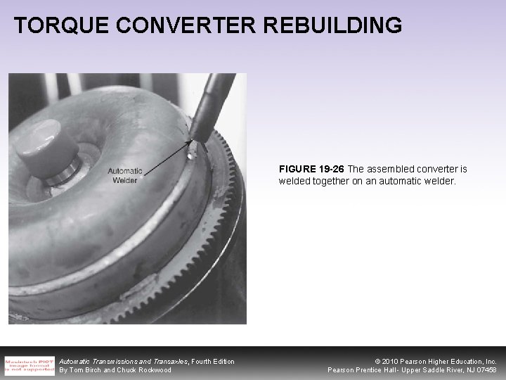 TORQUE CONVERTER REBUILDING FIGURE 19 -26 The assembled converter is welded together on an