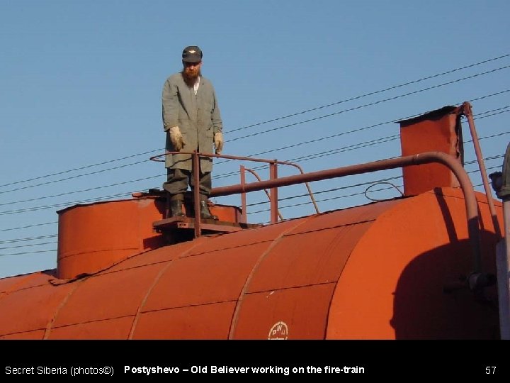 Secret Siberia (photos©) Postyshevo – Old Believer working on the fire-train 57 