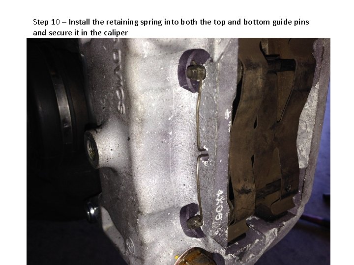 Step 10 – Install the retaining spring into both the top and bottom guide