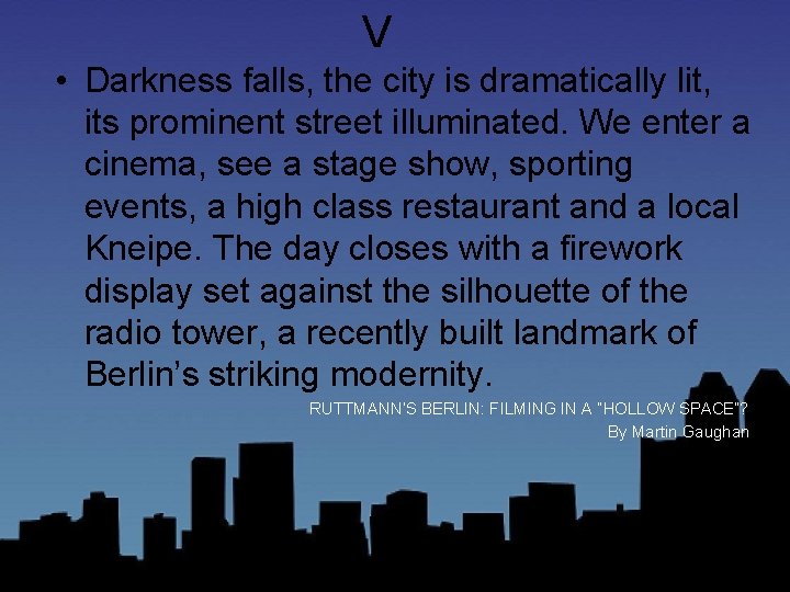 V • Darkness falls, the city is dramatically lit, its prominent street illuminated. We