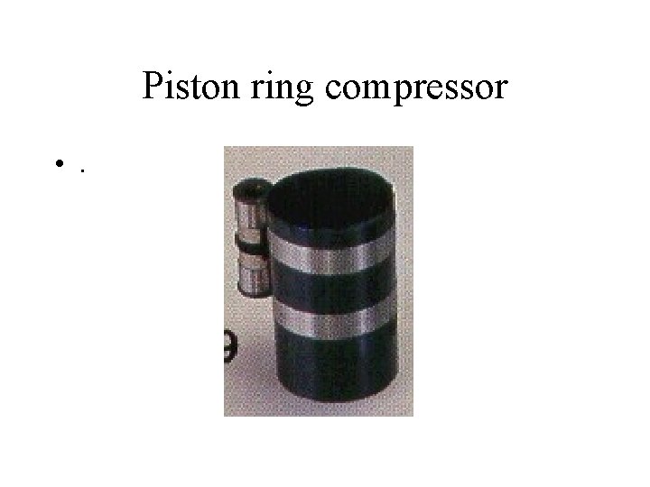 Piston ring compressor • . 