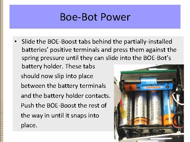 Boe-Bot Power • Slide the BOE-Boost tabs behind the partially-installed batteries’ positive terminals and